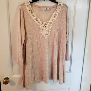 Kim Rogers. 1X.  beige top with lace detail.